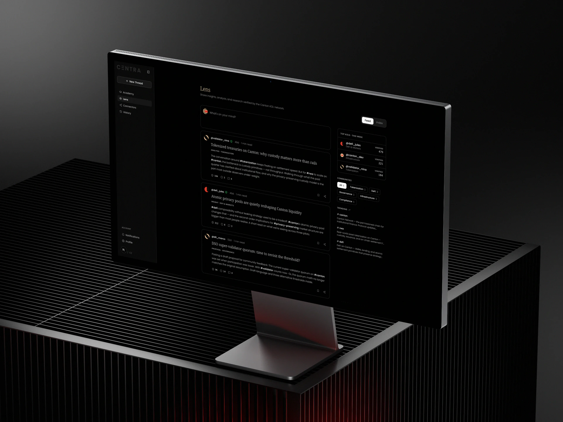 Centra on a monitor in a dark studio — the Lens feed for the Canton network.